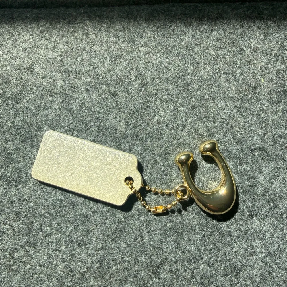 Coach New York Hang Tag Bag Charm Ivory With Gold Tone C Clasp